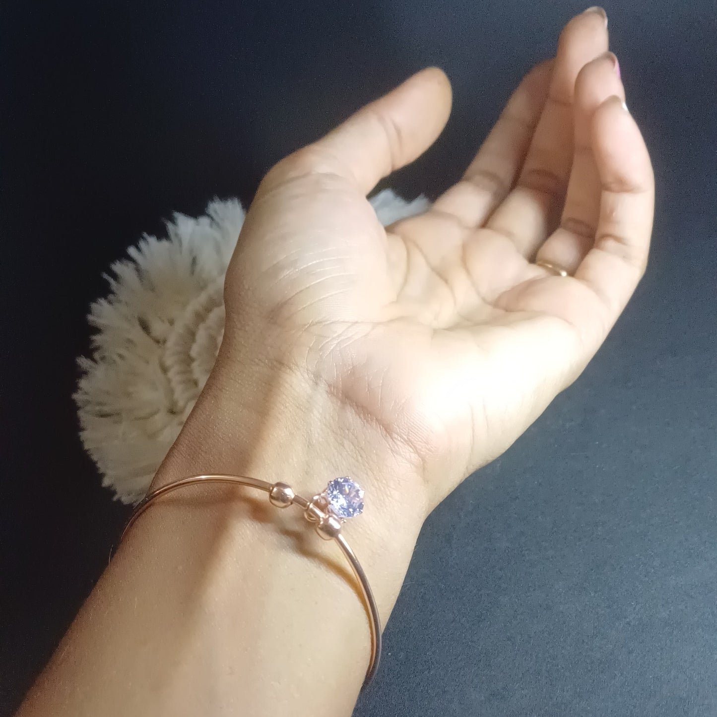 Round cut golden cuff bracelet with round solitaire