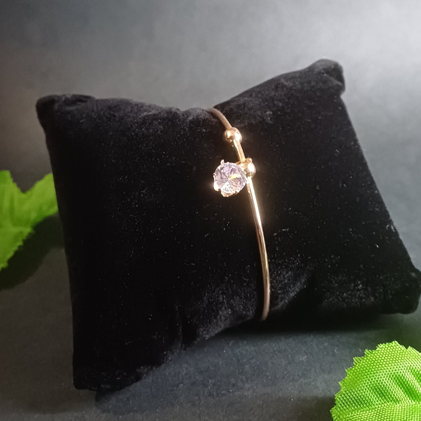 Round cut golden cuff bracelet with round solitaire