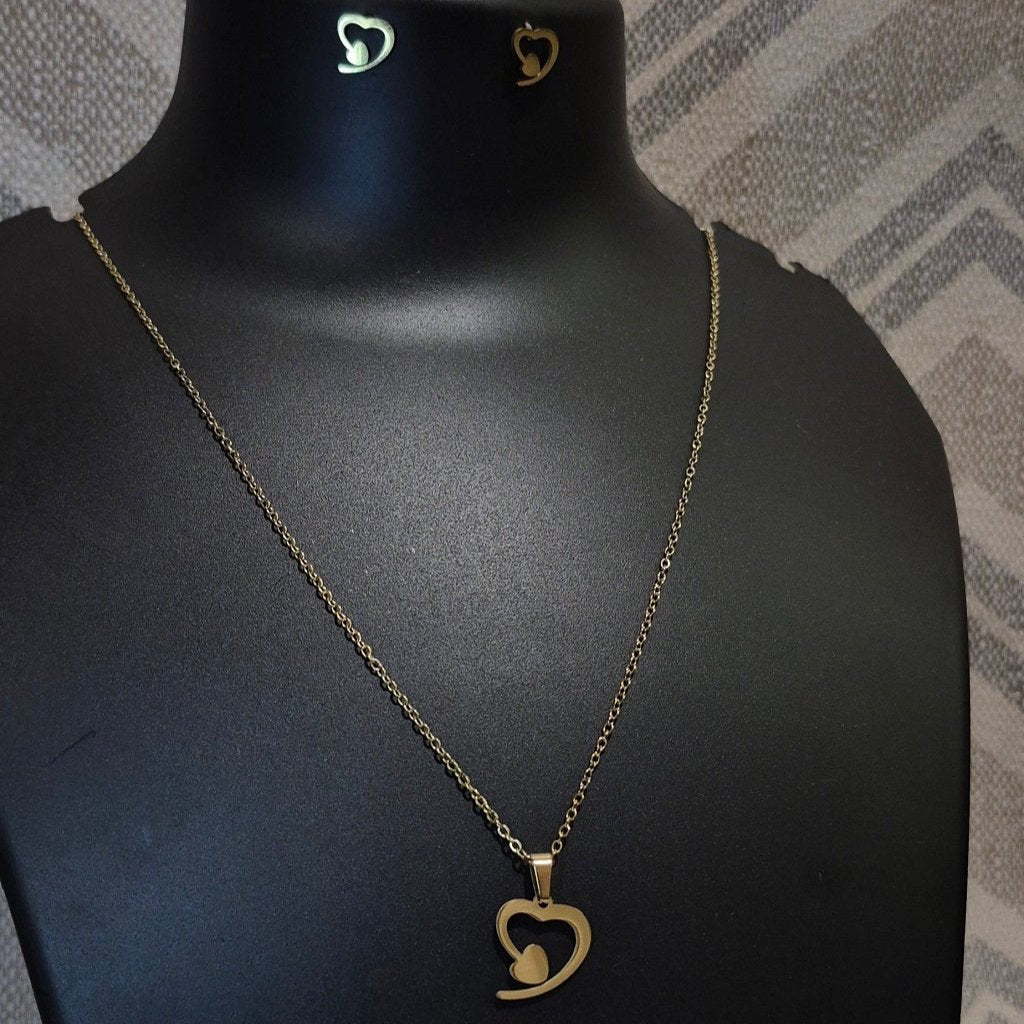 Golden arrow heart stylish chain_4 pendant with matching ear tops tarnish free for Girls women others