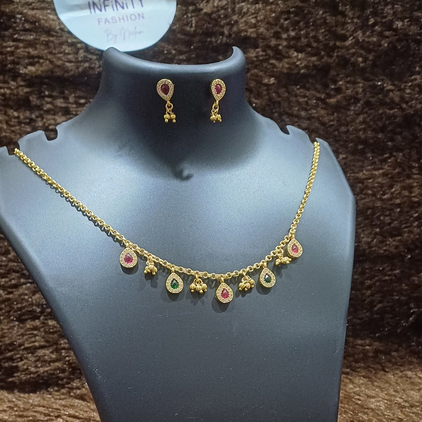 Chain with rhinestoned tear drops and balls hanging with matching earrings
