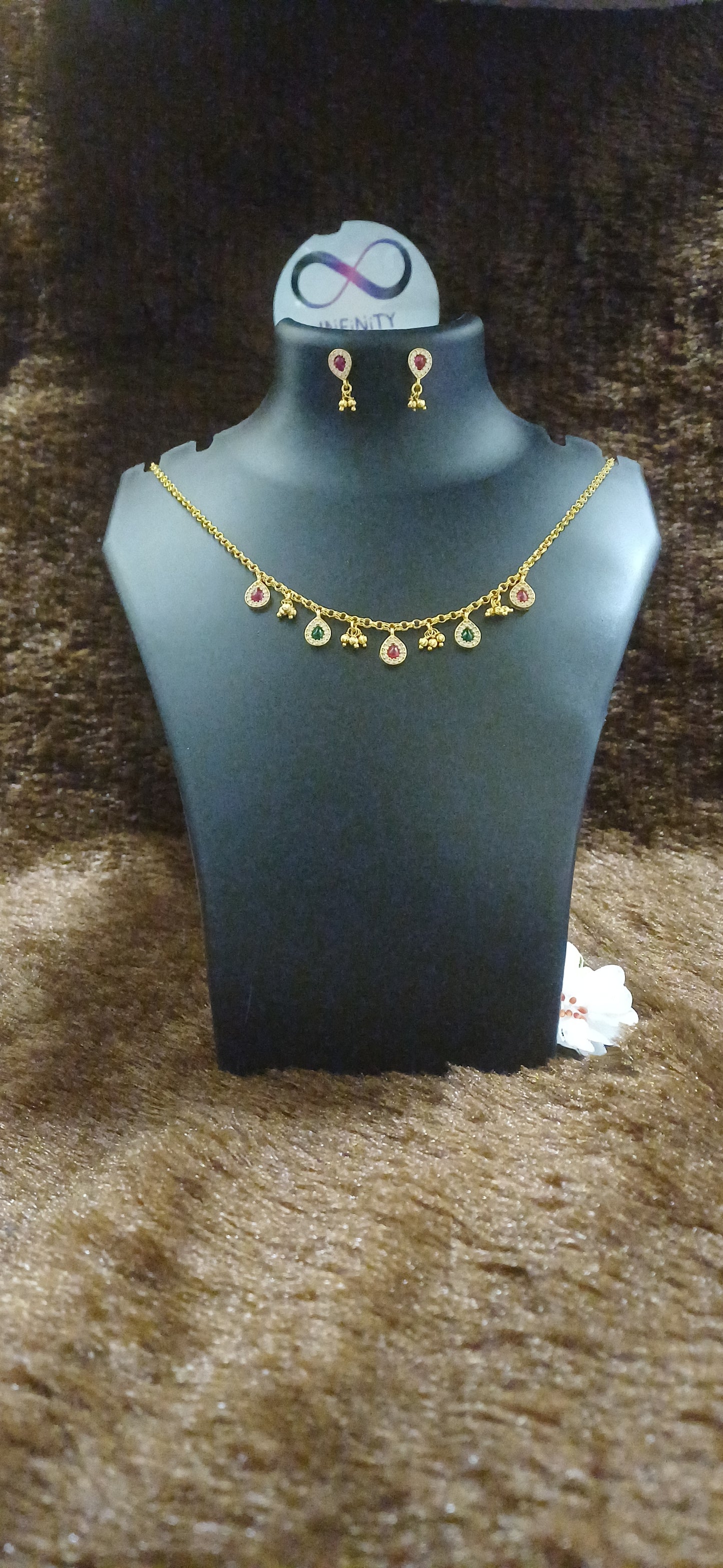 Chain with rhinestoned tear drops and balls hanging with matching earrings