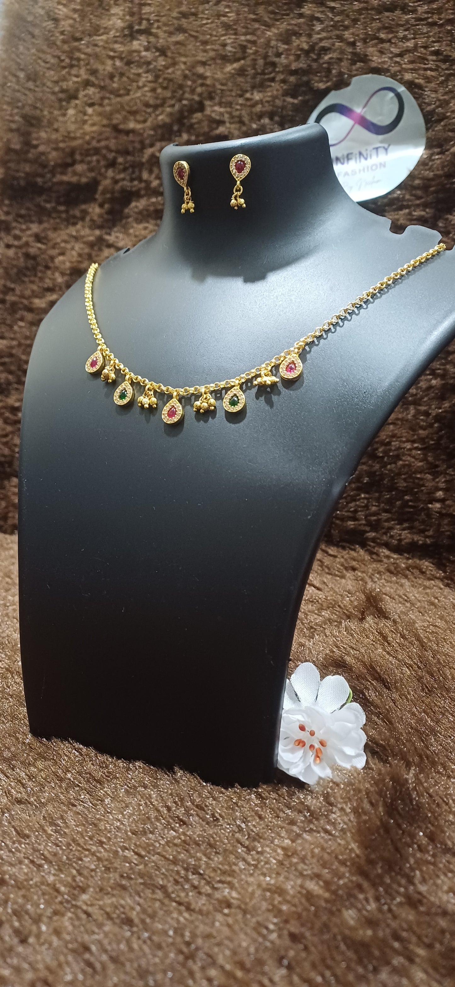 Chain with rhinestoned tear drops and balls hanging with matching earrings