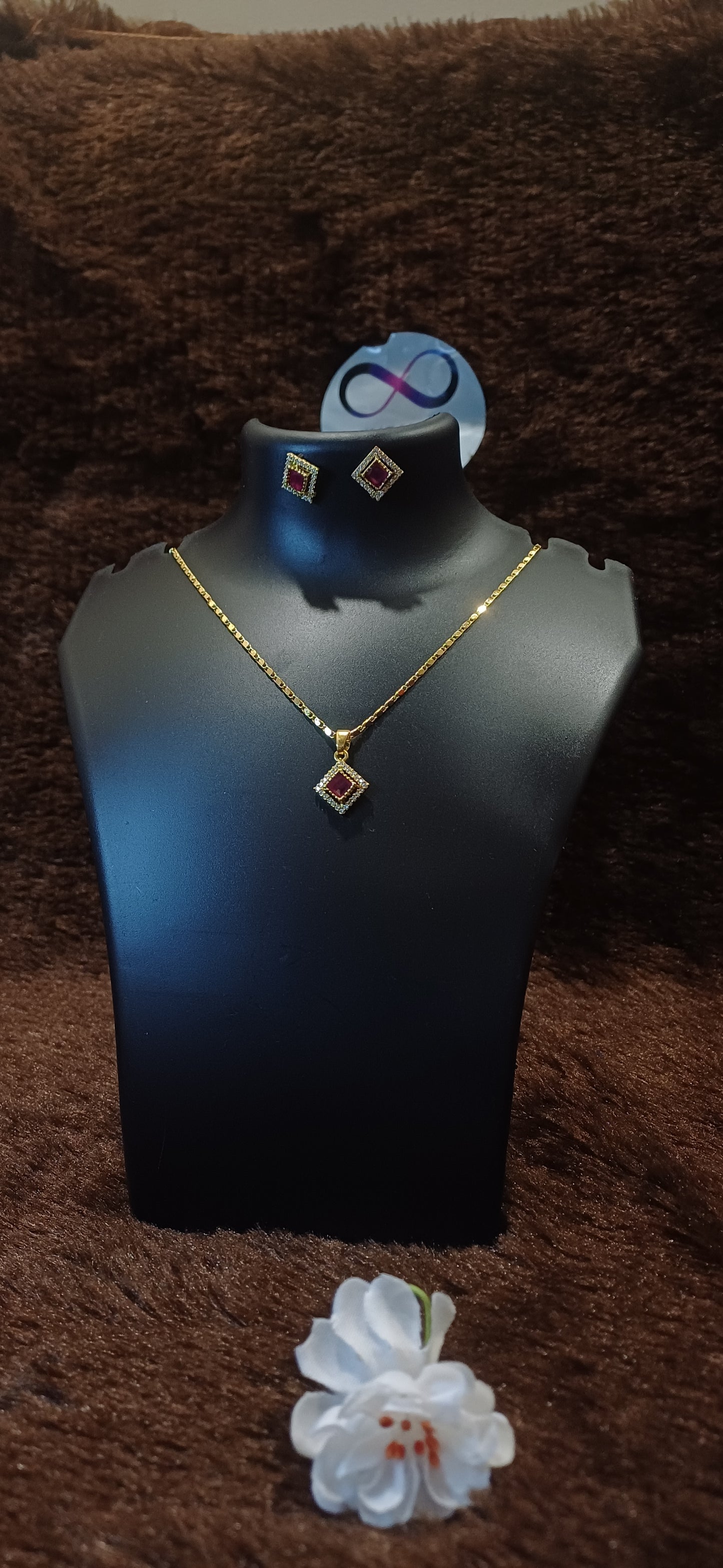 Ruby rhinestone chain pendant with matching ear studs