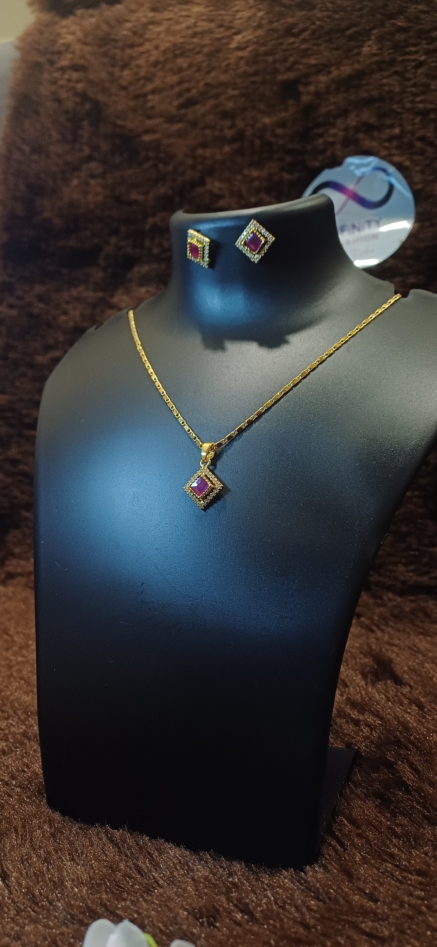 Ruby rhinestone chain pendant with matching ear studs