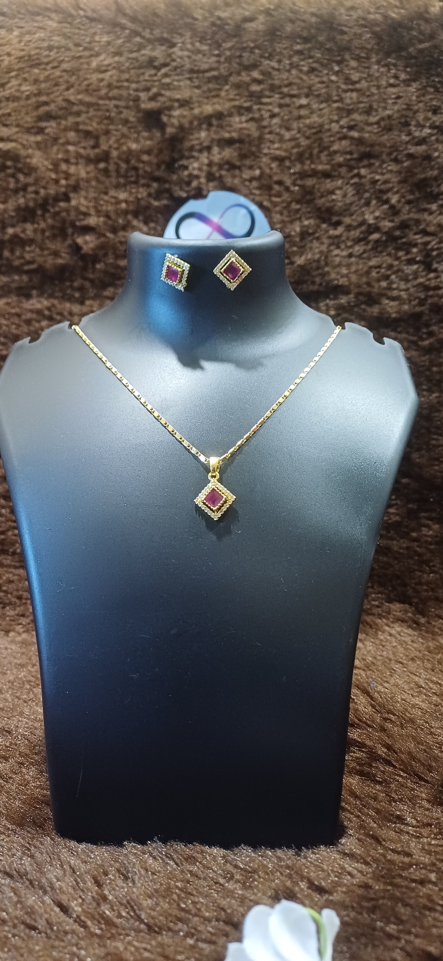 Ruby rhinestone chain pendant with matching ear studs