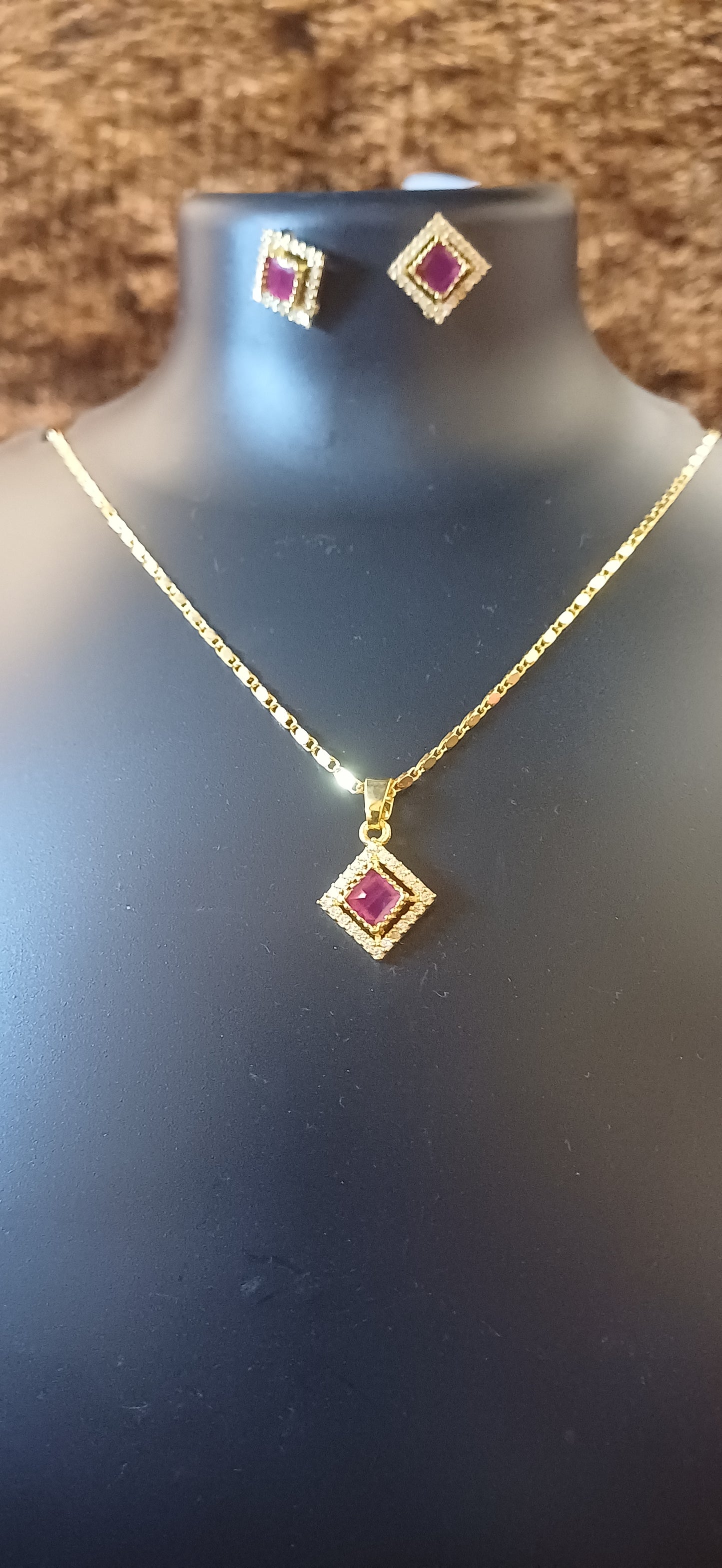 Ruby rhinestone chain pendant with matching ear studs