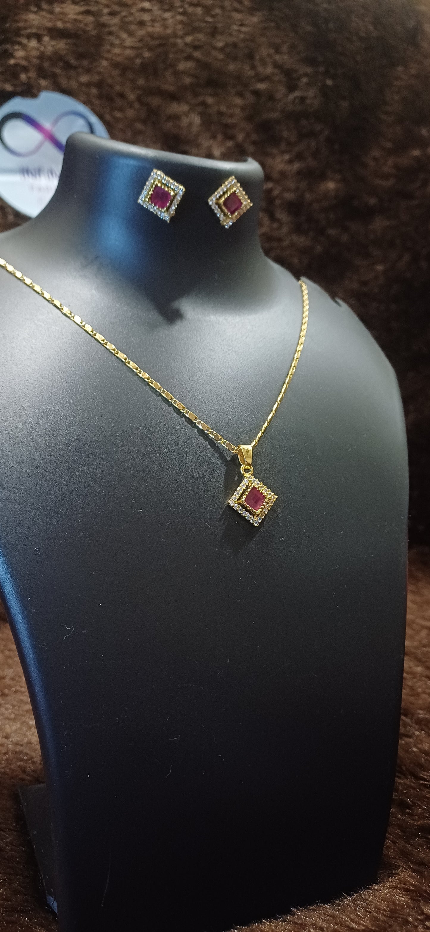 Ruby rhinestone chain pendant with matching ear studs