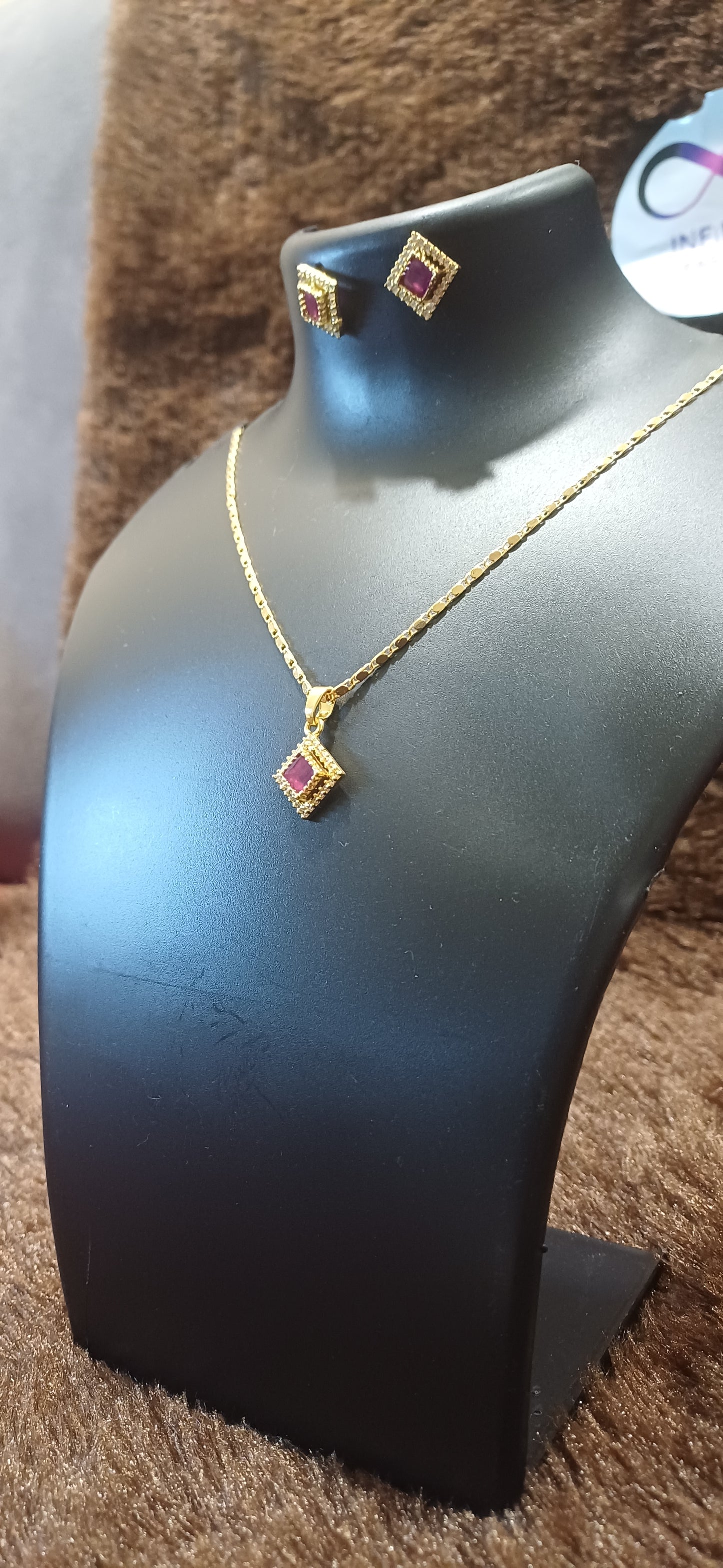 Ruby rhinestone chain pendant with matching ear studs