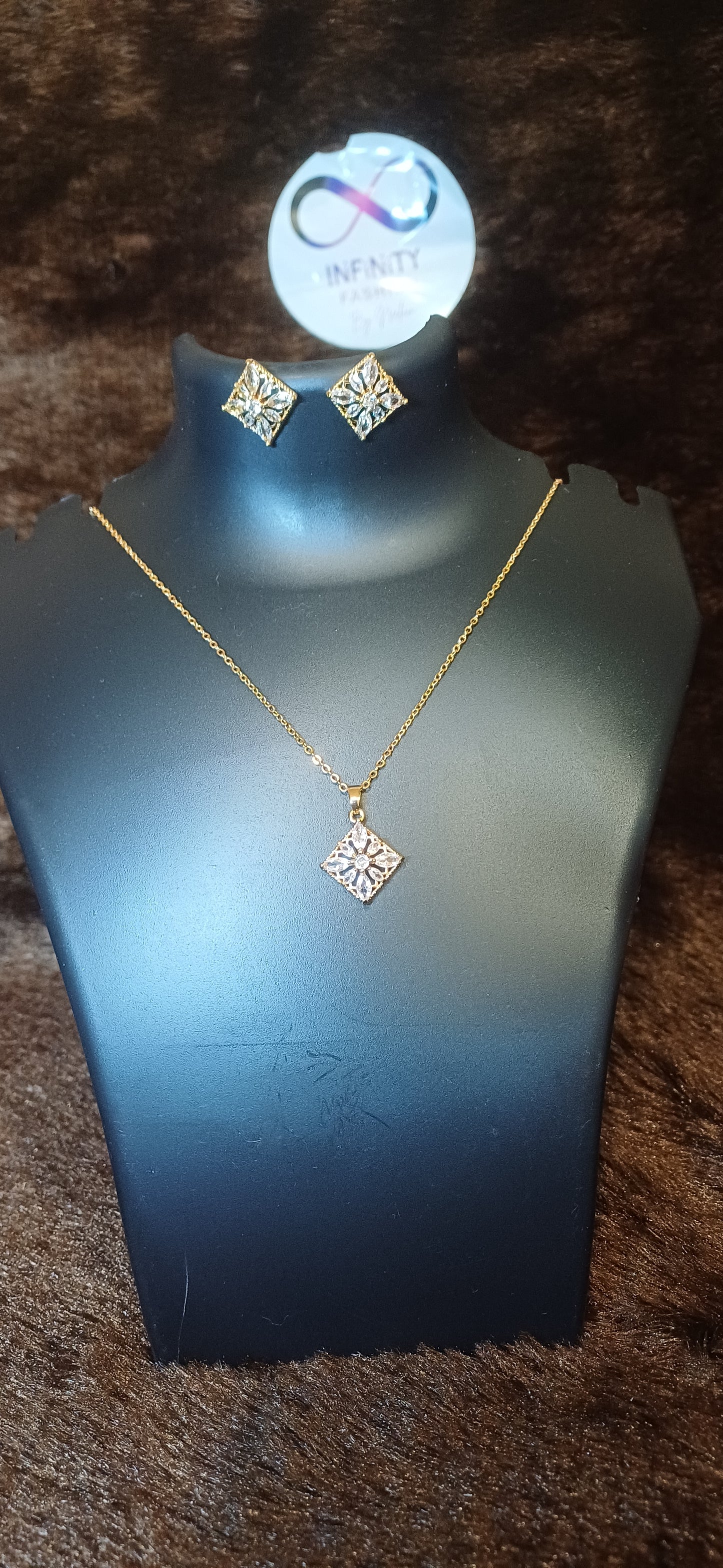 Square cut crystal studded pendant and chain with matching earrings
