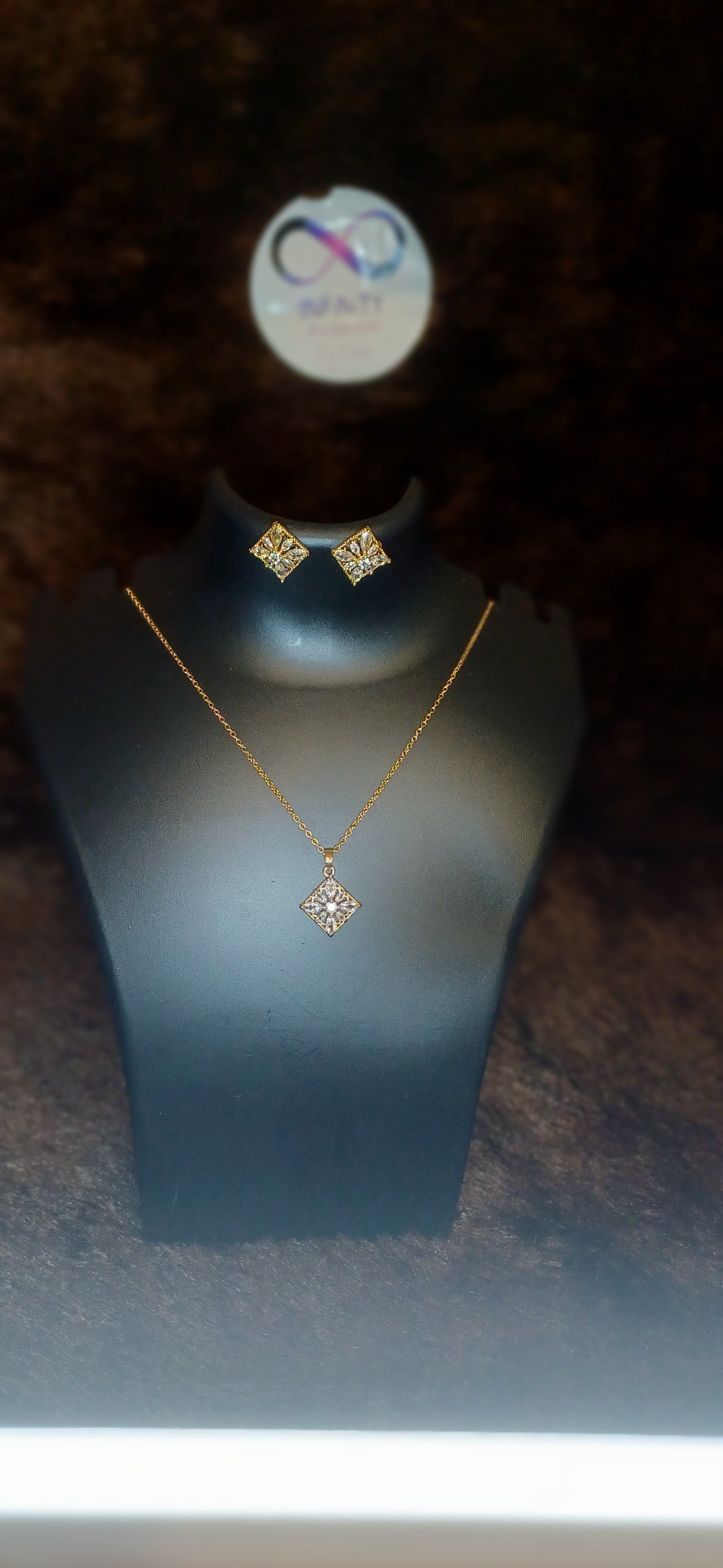 Square cut crystal studded pendant and chain with matching earrings