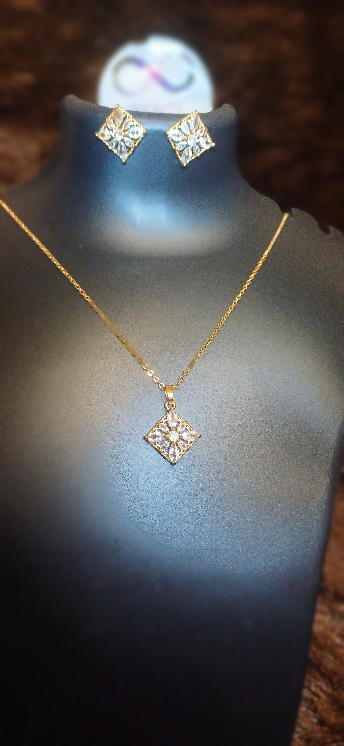 Square cut crystal studded pendant and chain with matching earrings