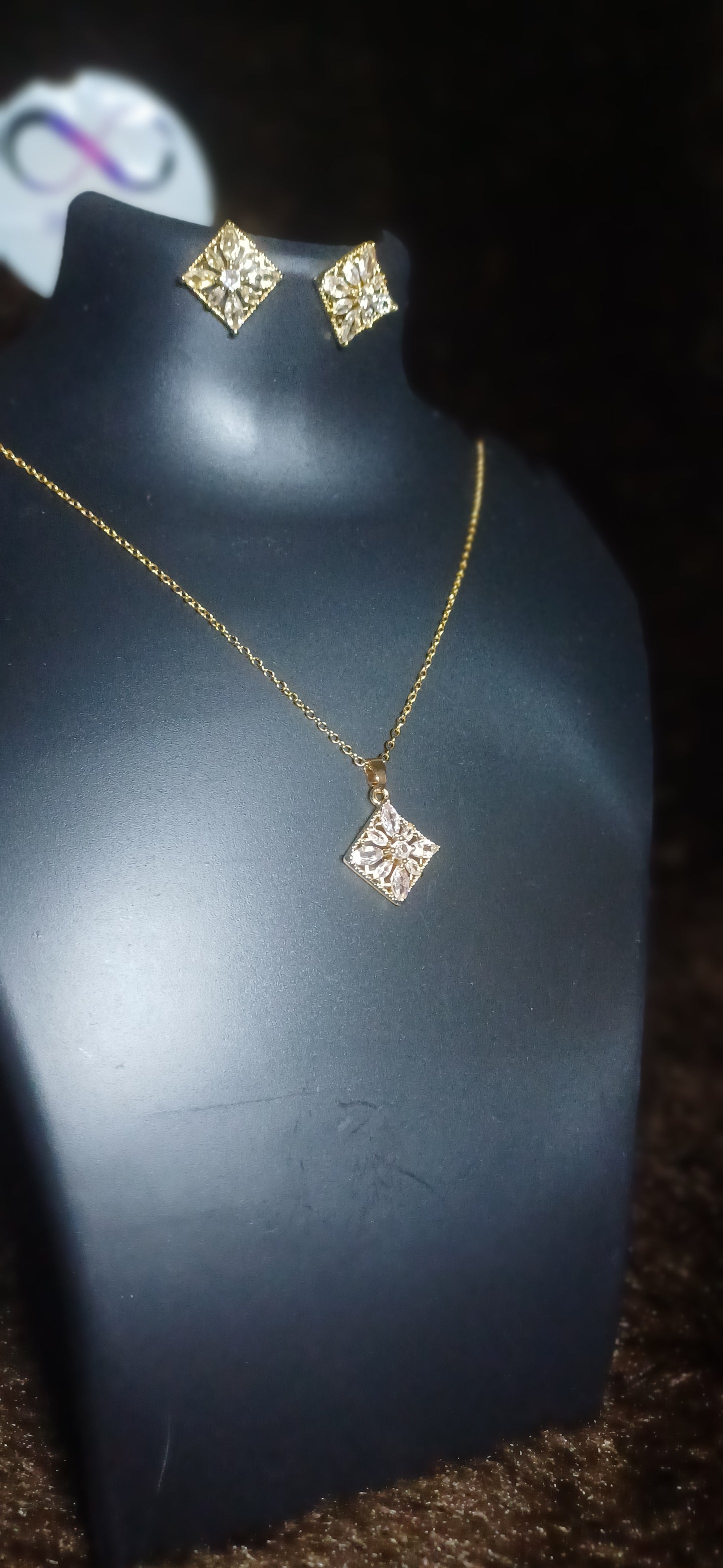 Square cut crystal studded pendant and chain with matching earrings