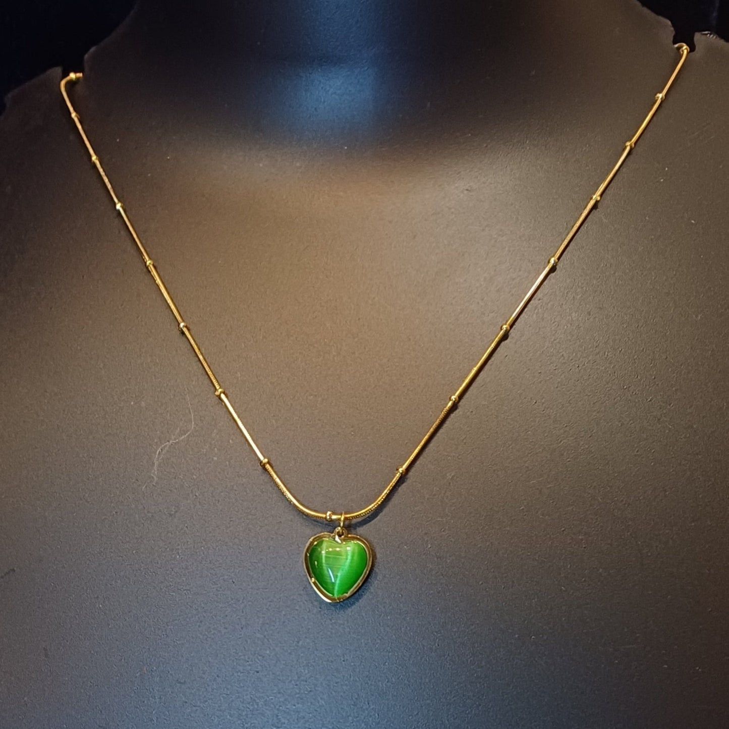 Heart of emerald pendant with golden dotted chain_anti tarnish