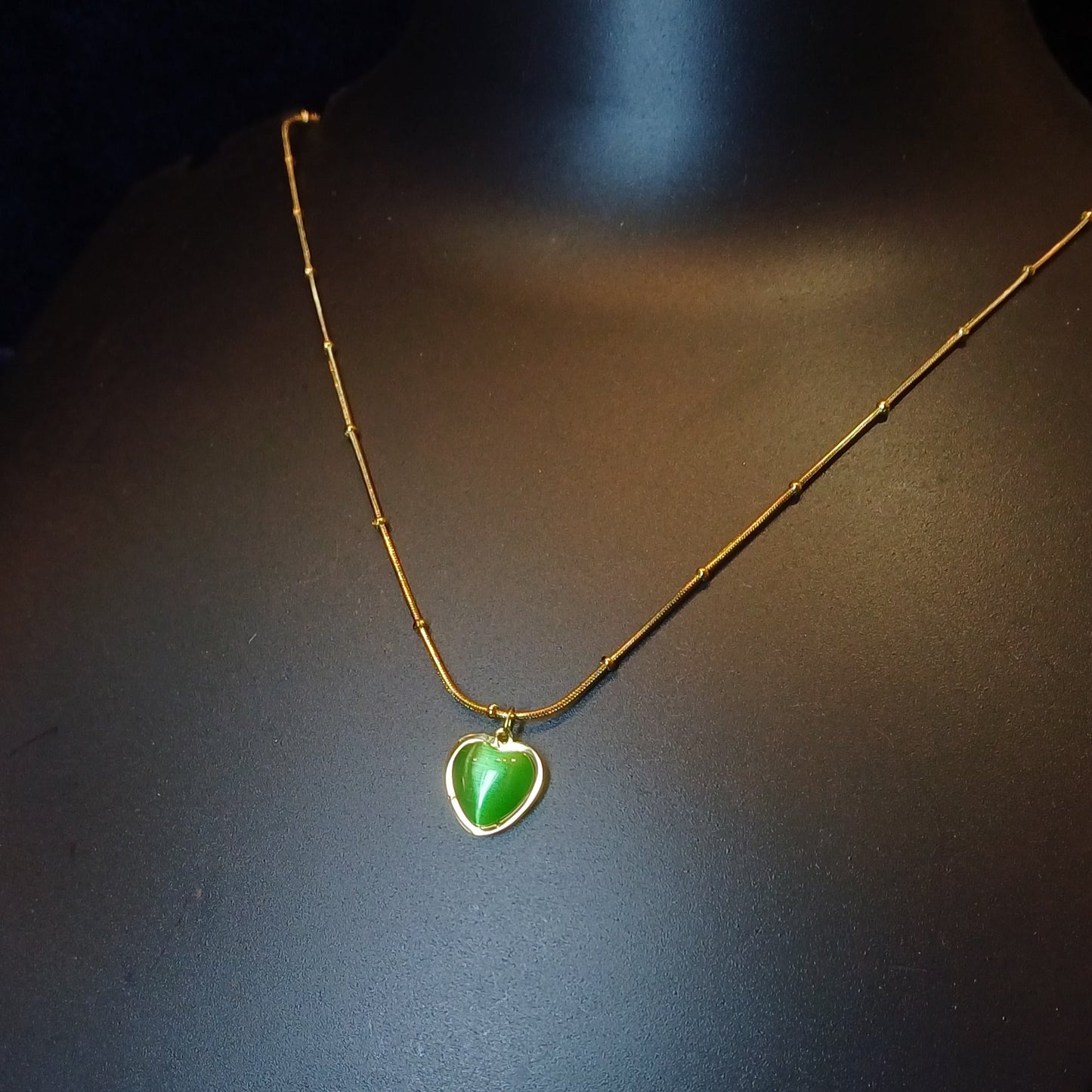 Heart of emerald pendant with golden dotted chain_anti tarnish