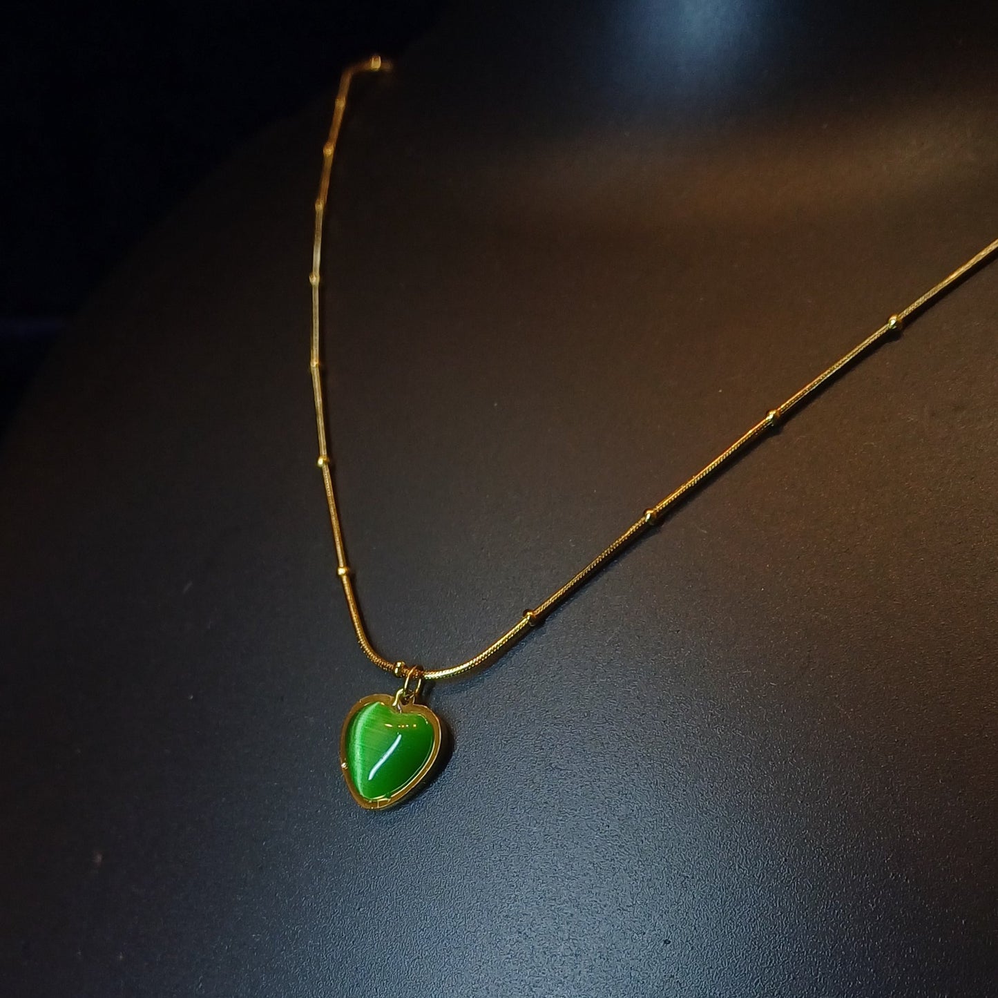 Heart of emerald pendant with golden dotted chain_anti tarnish