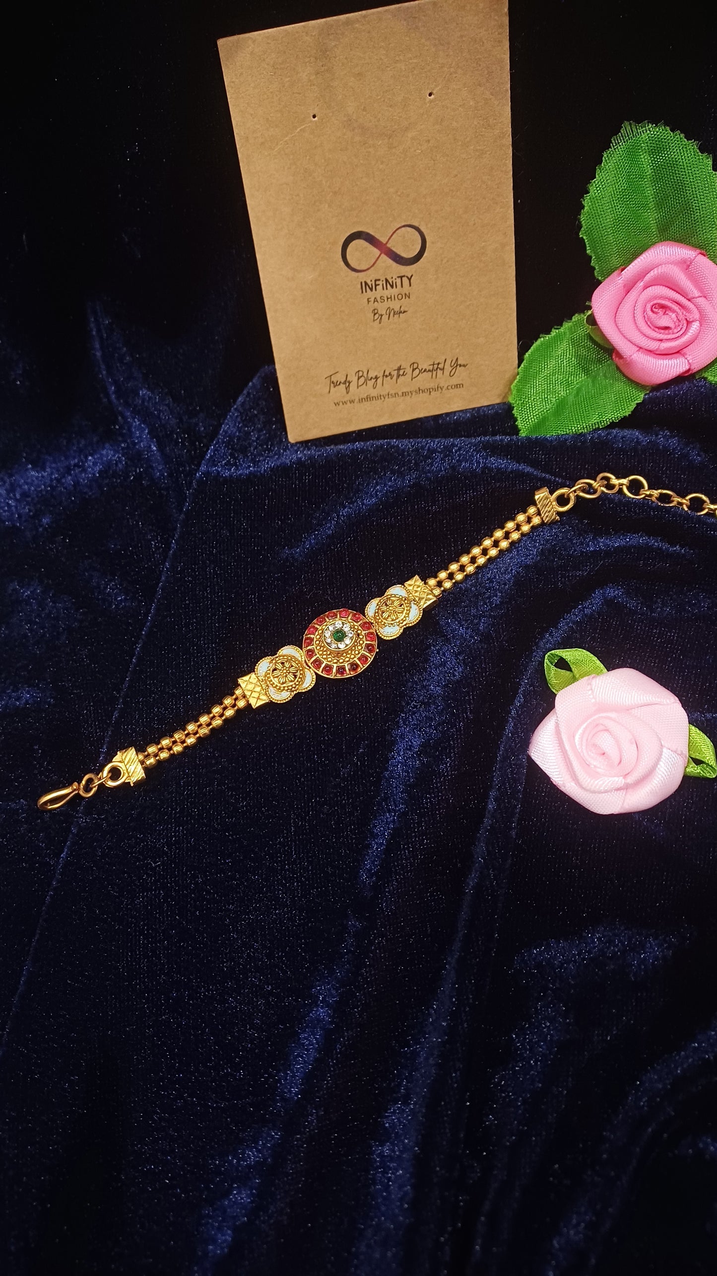 Ruby stoned golden bracelet balled loose straps_ designer