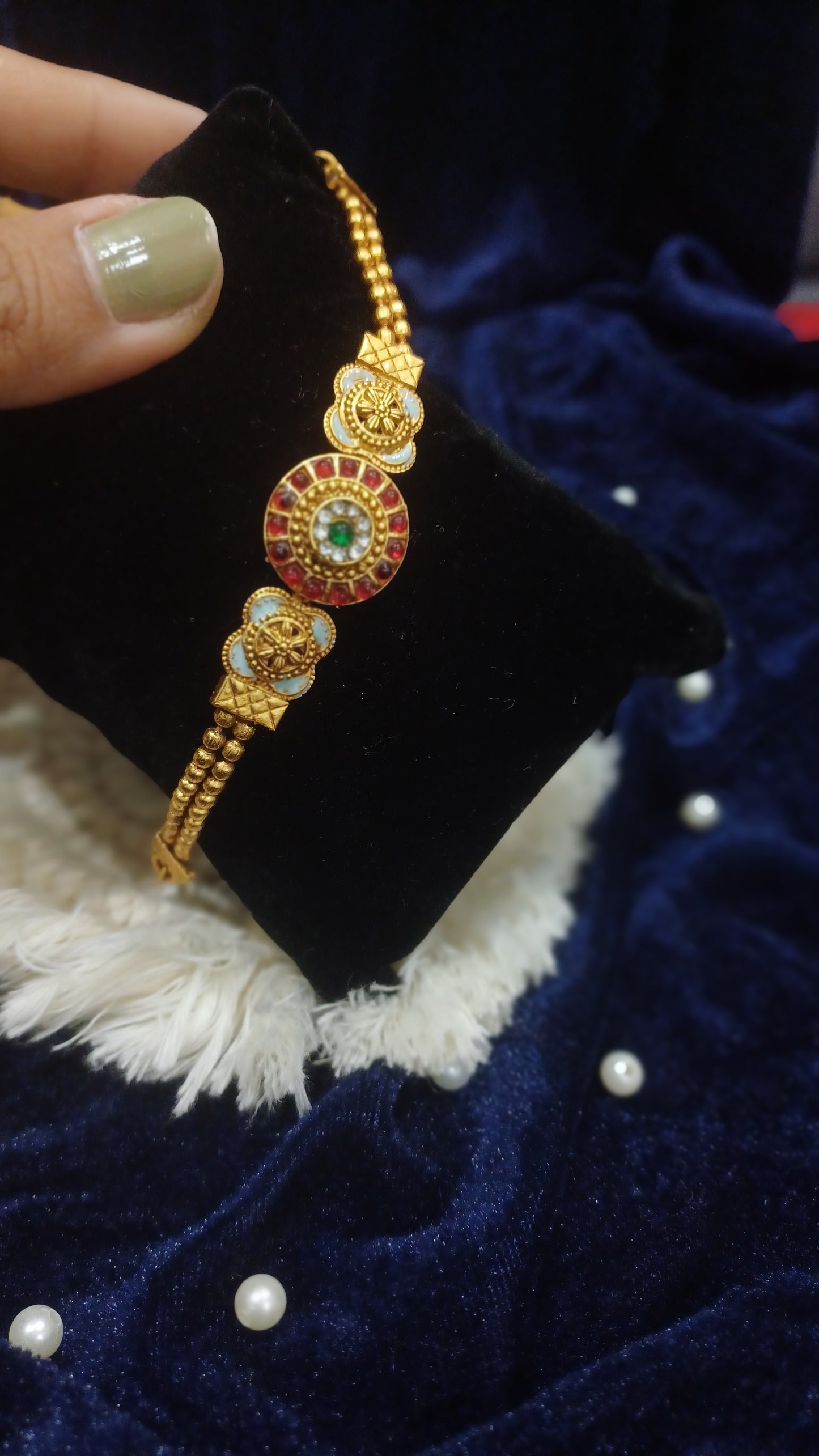 Ruby stoned golden bracelet balled loose straps_ designer