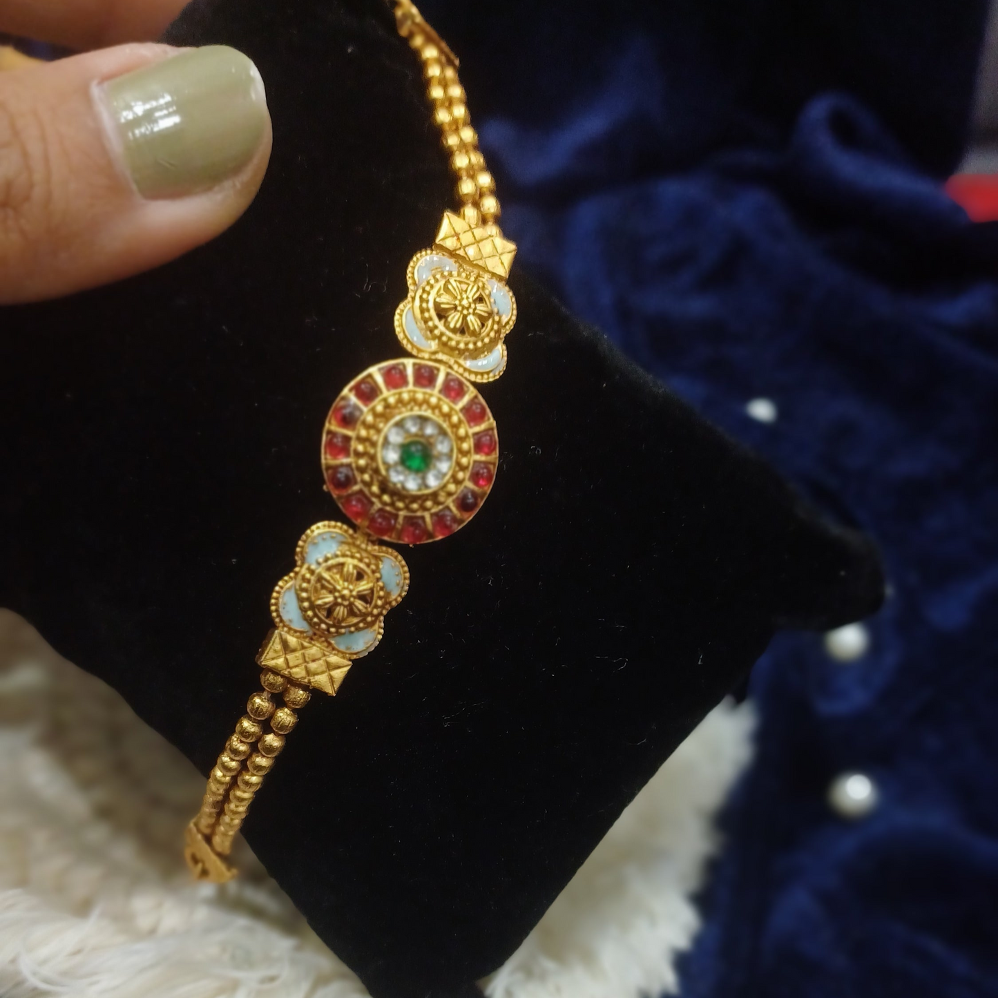 Ruby stoned golden bracelet balled loose straps_ designer