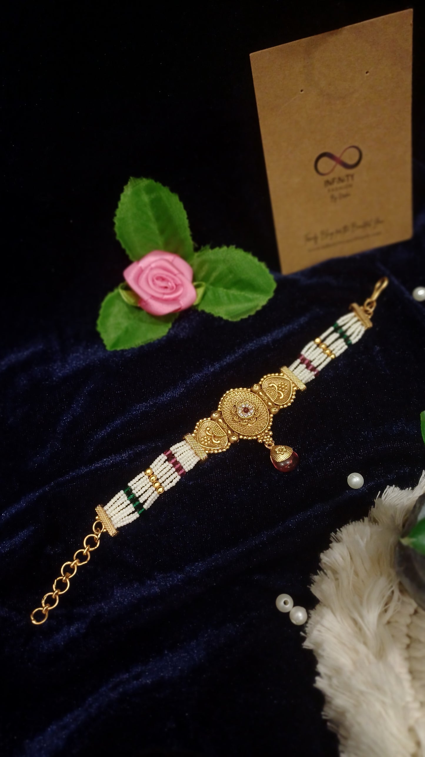 Golden loose bracelet with hanging pearl multistrands_ designer traditional look