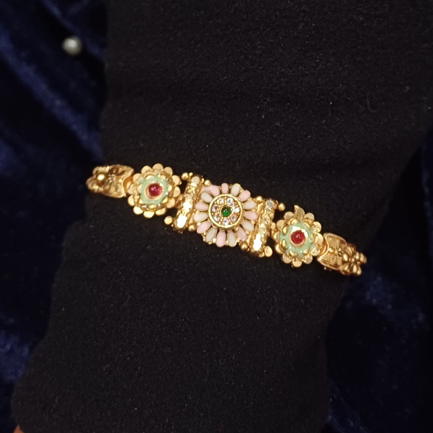 Golden sleek bracelet loose balled straps_ flower designs traditional look