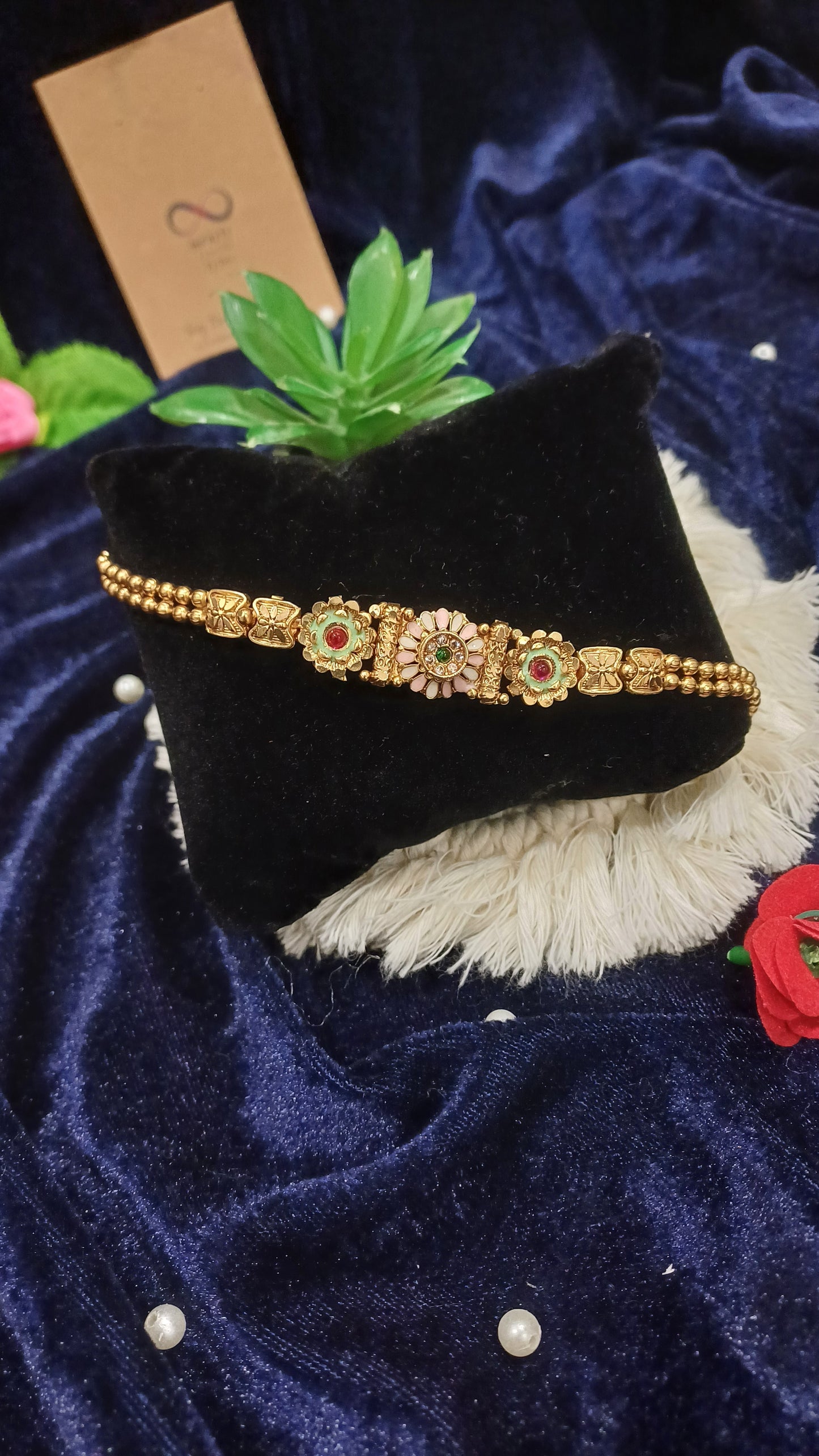 Golden sleek bracelet loose balled straps_ flower designs traditional look
