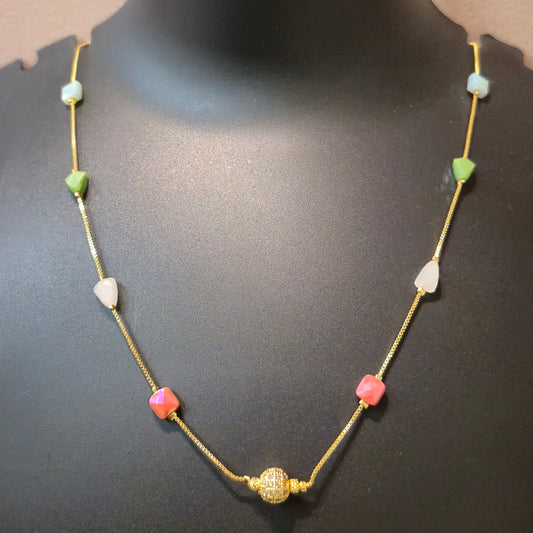 Necklace with multicolor beaded chain golden ball pendant