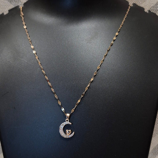 Half moon diamond pendant and braided chain